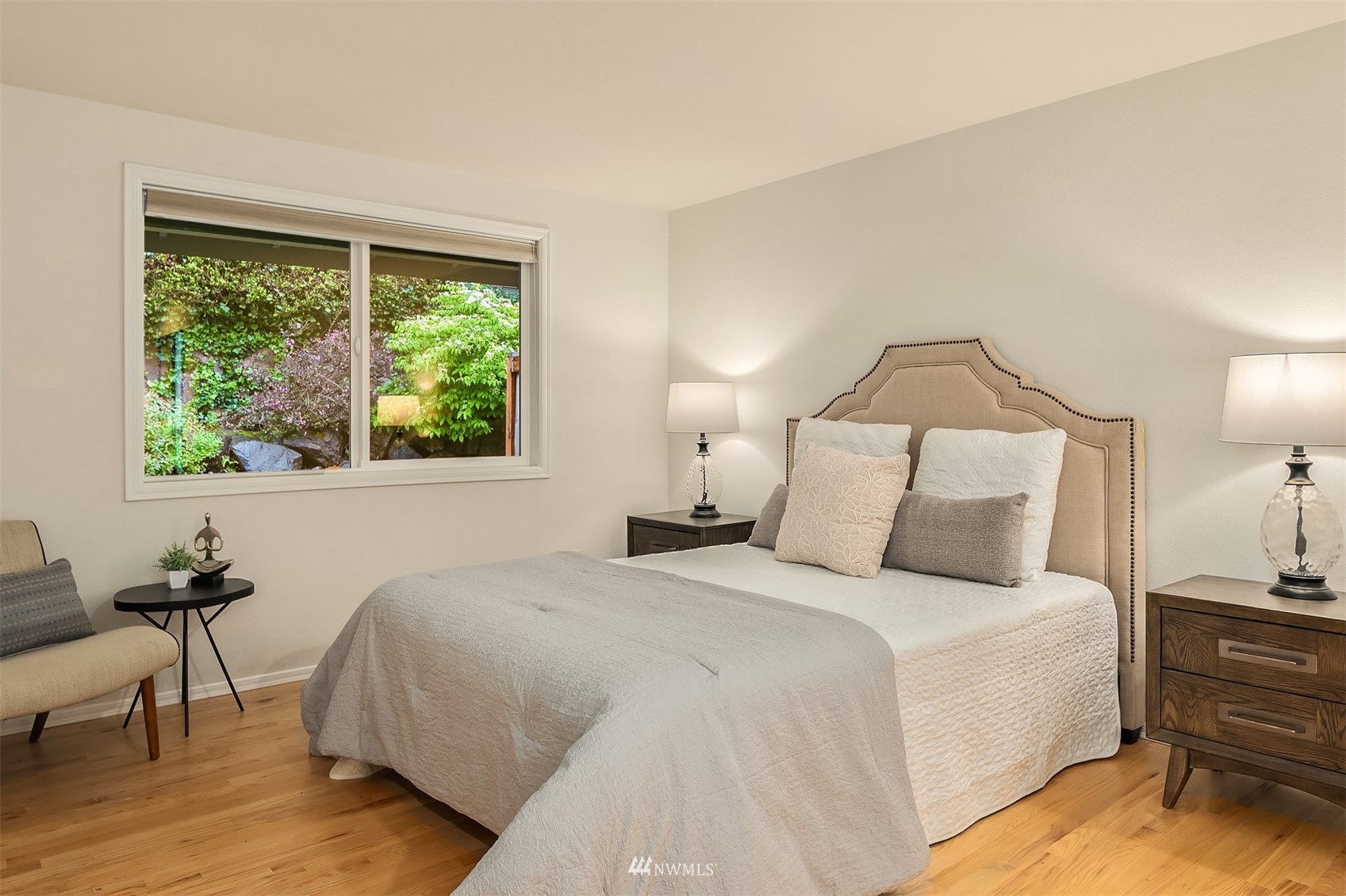 6730 114th Avenue Southeast Bellevue, WA 98006 - Photo 20 of 32 a bedroom with a bed and a window