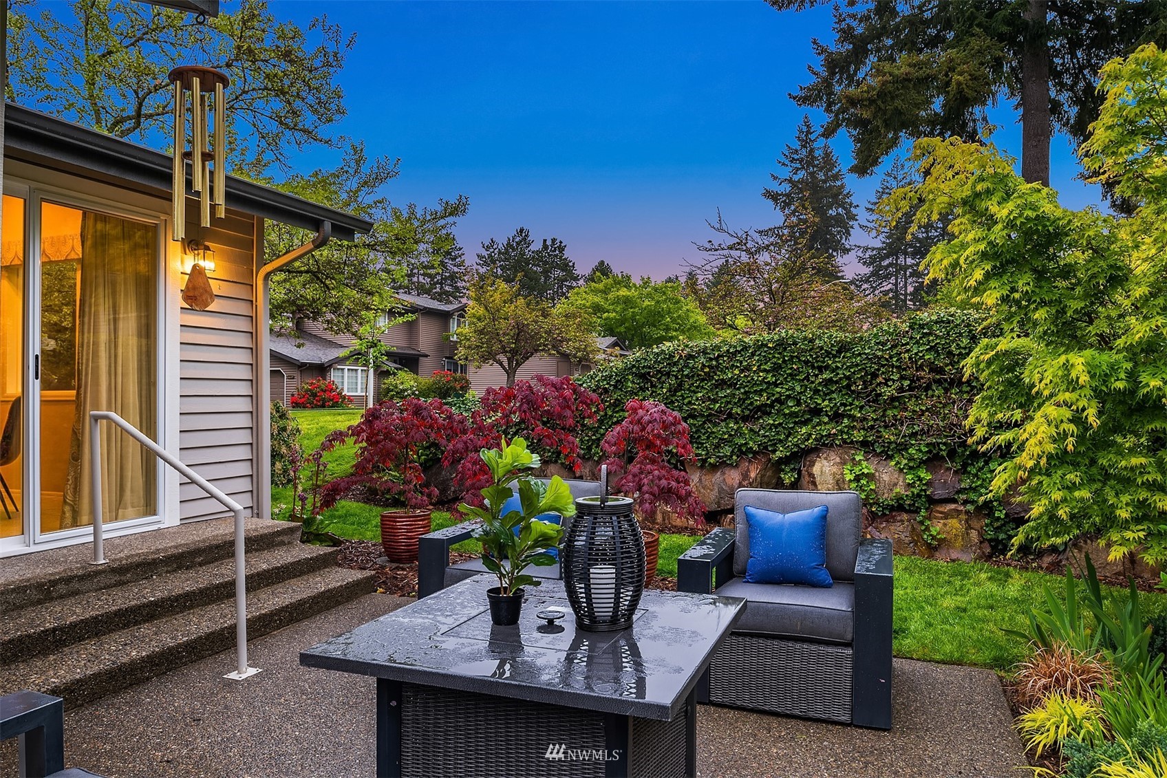 6730 114th Avenue Southeast Bellevue, WA 98006 - Photo 30 of 32 a view of a chairs and table in a patio