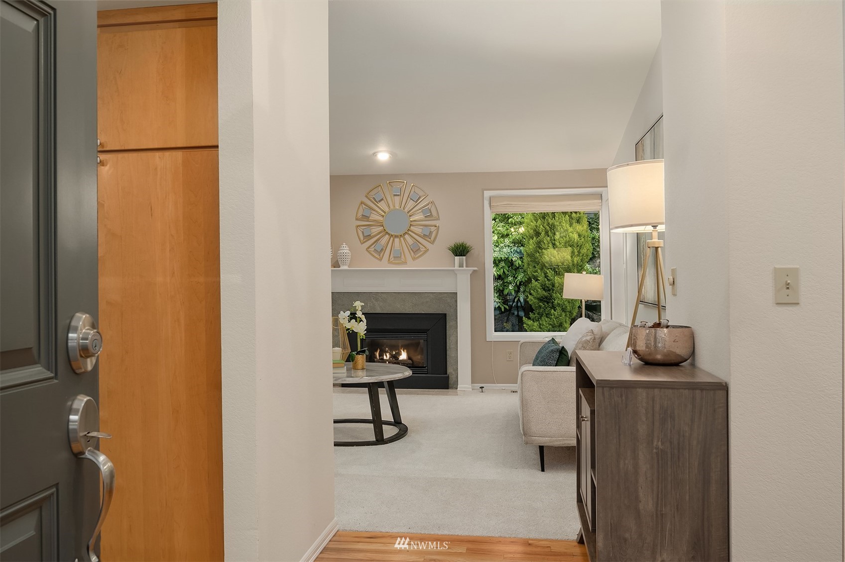 6730 114th Avenue Southeast Bellevue, WA 98006 - Photo 5 of 32 a living room with furniture and a fireplace