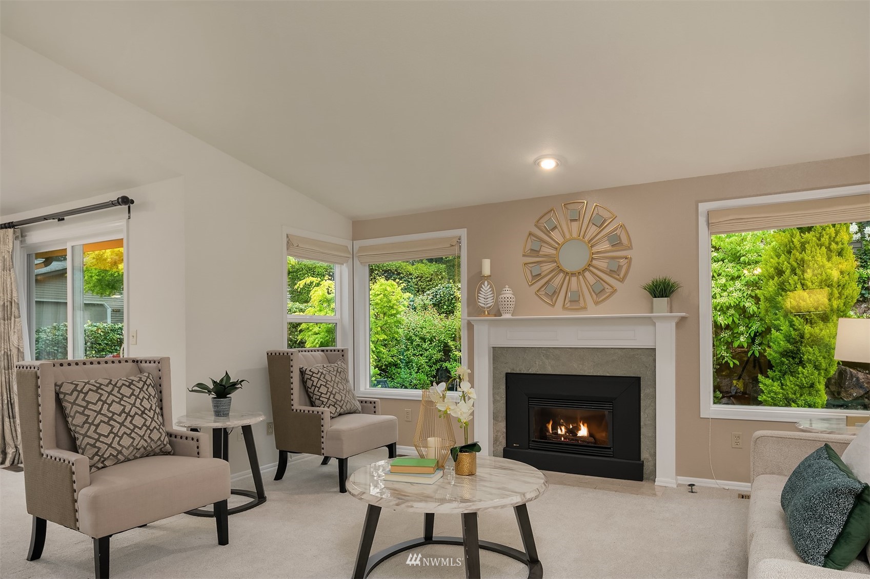6730 114th Avenue Southeast Bellevue, WA 98006 - Photo 6 of 32 a living room with furniture and a fireplace