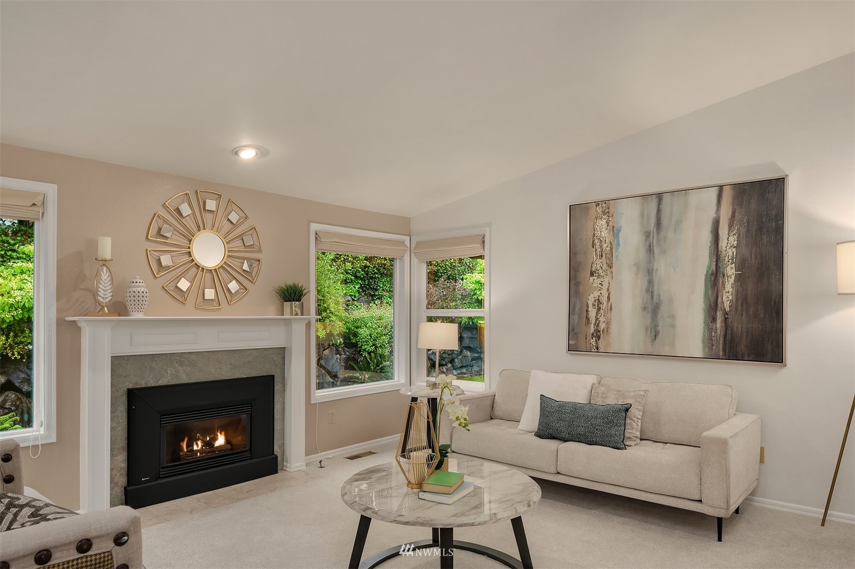 6730 114th Avenue Southeast Bellevue, WA 98006 - Photo 7 of 32 a living room with furniture and a fireplace