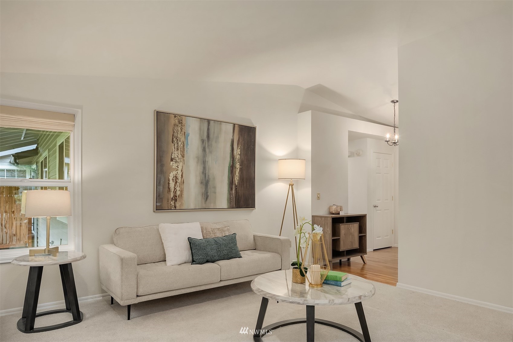 6730 114th Avenue Southeast Bellevue, WA 98006 - Photo 8 of 32 a living room with furniture and a lamp