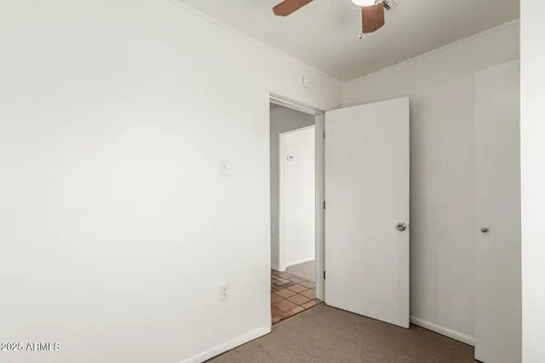 a view of a room with a hallway