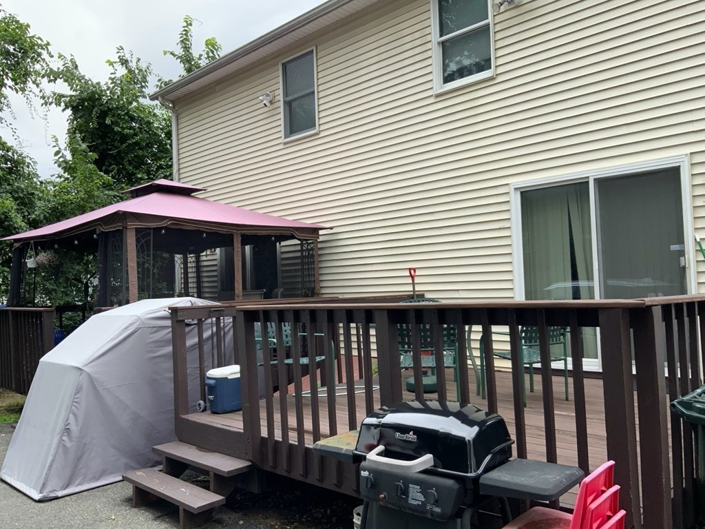 39-41 Eddy Street Springfield, MA 01104 - Photo 15 of 21 a view of a chair and tables on the deck