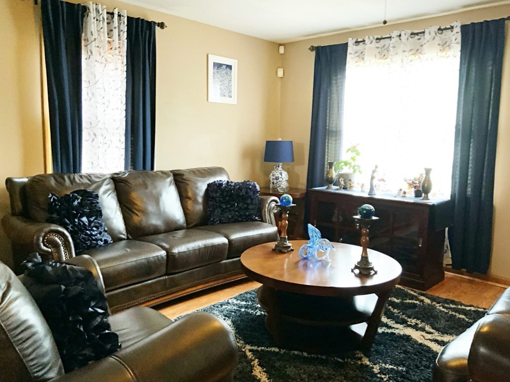 39-41 Eddy Street Springfield, MA 01104 - Photo 4 of 21 a living room with furniture and a table