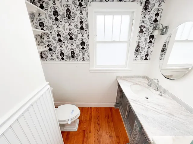 a bathroom with a bathtub and a sink
