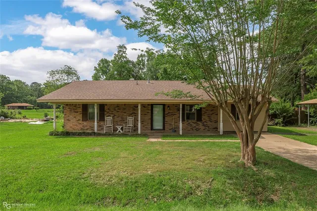 a view of a house with a garden