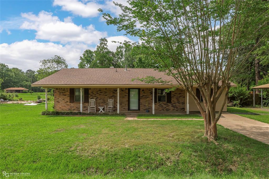 a view of a house with a garden