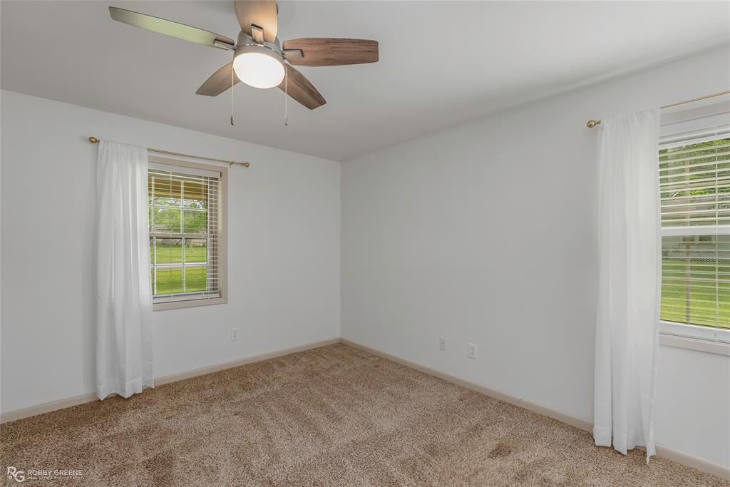 905 College Street Doyline, LA 71023 - Photo 15 of 26 a view of an empty room with a window