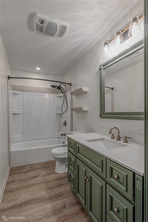 905 College Street Doyline, LA 71023 - Photo 17 of 26 a bathroom with a double vanity sink and a mirror