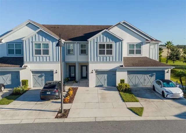 a front view of a house with a patio