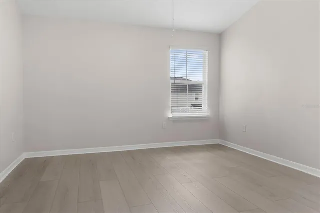 an empty room with a window