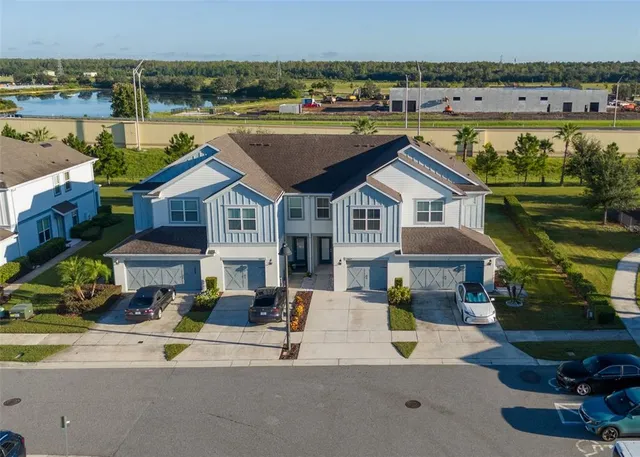 a view of a house with outdoor space and sitting area
