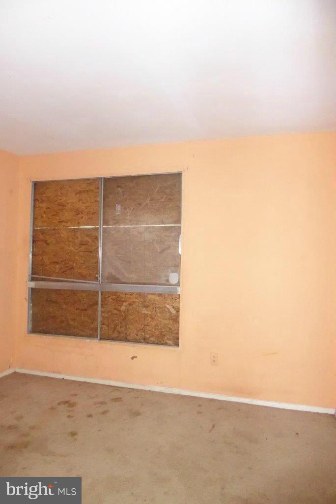7957 Riggs Road, Unit 2 Hyattsville, MD 20783 - Photo 10 of 17 a view of wooden fence