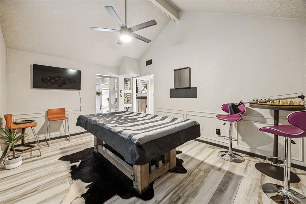 3601 Colosseum Way Grand Prairie, TX 75052 - Photo 11 of 28 a living room with furniture and a flat screen tv