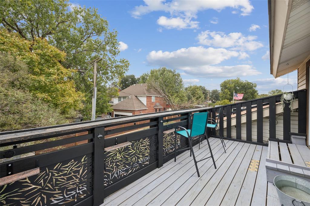 3601 Colosseum Way Grand Prairie, TX 75052 - Photo 23 of 28 a view of balcony with wooden floor and fence