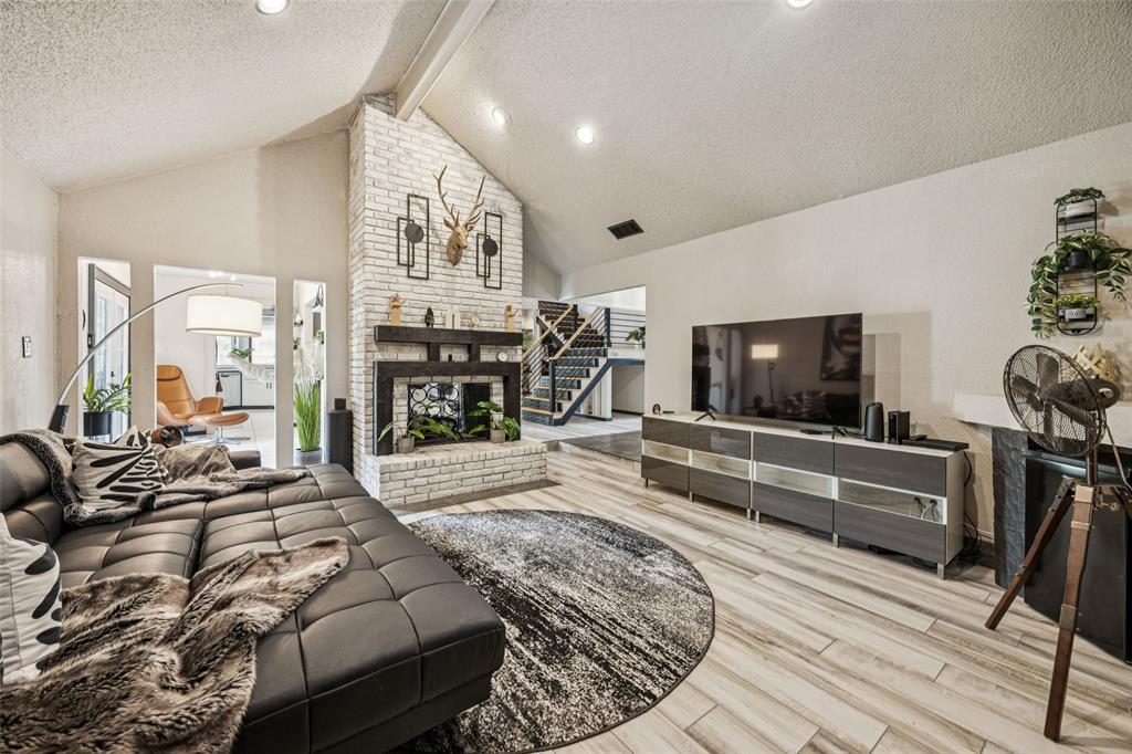 3601 Colosseum Way Grand Prairie, TX 75052 - Photo 4 of 28 a bedroom with furniture and a flat screen tv