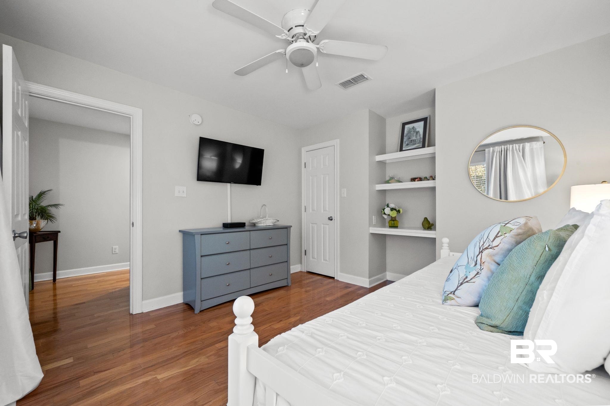 1825 Spring Hill Avenue Mobile, AL 36607 - Photo 23 of 43 Bedroom featuring dark wood-style flooring and ceiling fan
