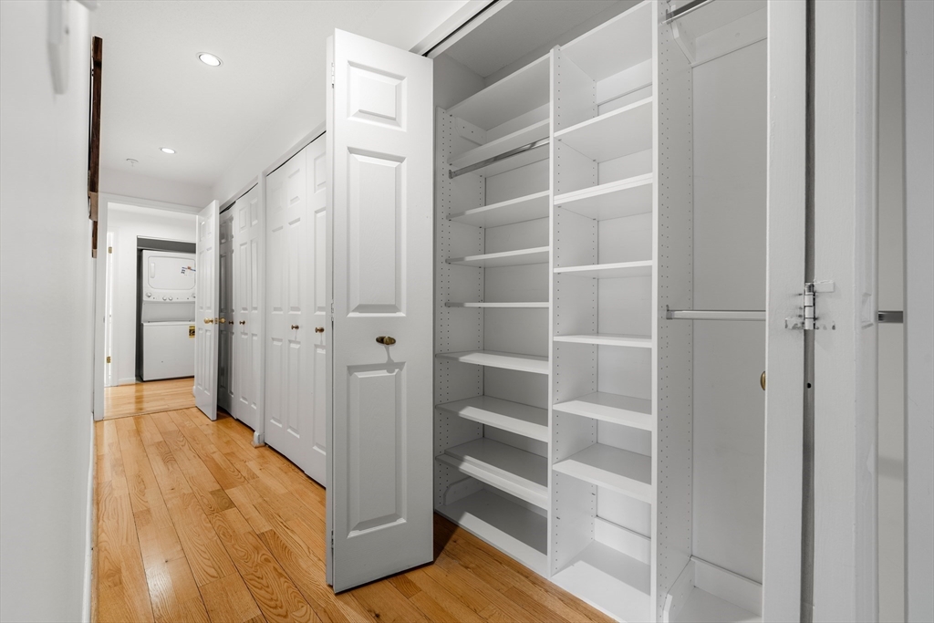 11 Church Street, Unit 203 Salem, MA 01970 - Photo 12 of 40 a view of walk in closet with empty racks