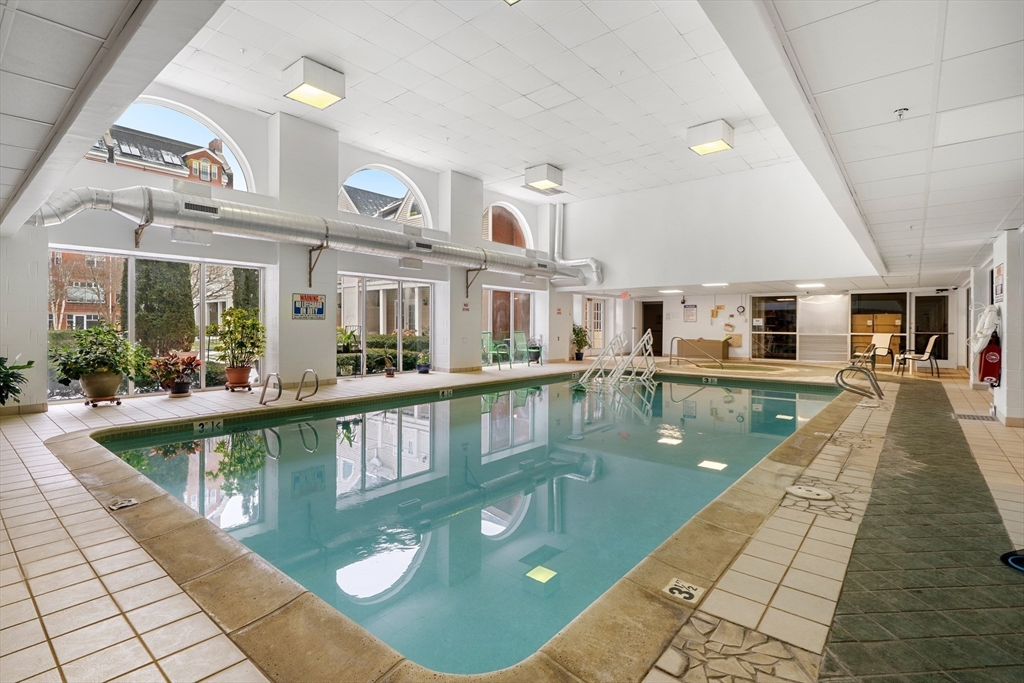 11 Church Street, Unit 203 Salem, MA 01970 - Photo 24 of 40 a view of a swimming pool with a patio