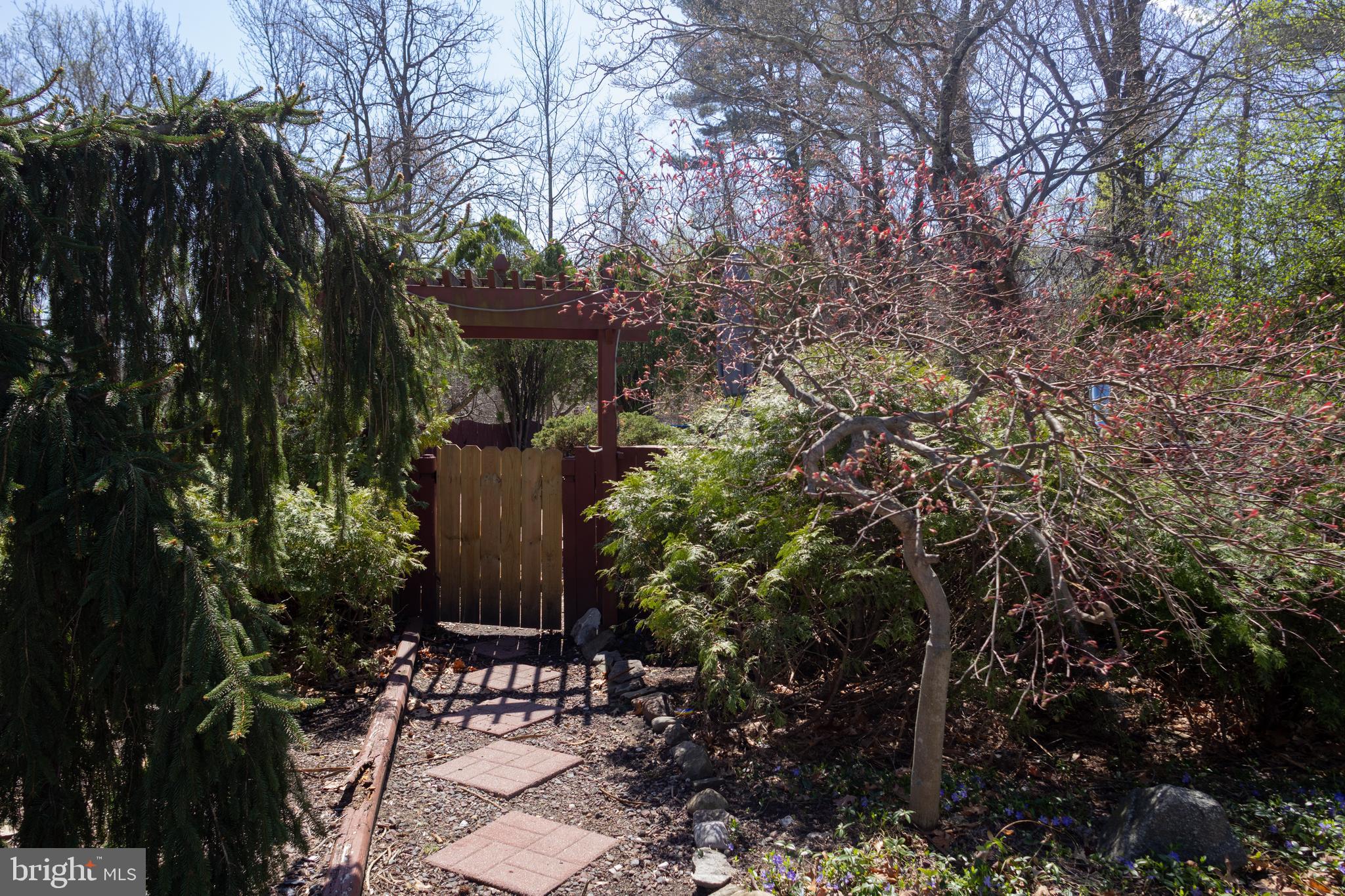 53 Kirkwood Road Gibbsboro, NJ 08026 - Photo 34 of 37 a view of a patio with chairs and potted plants