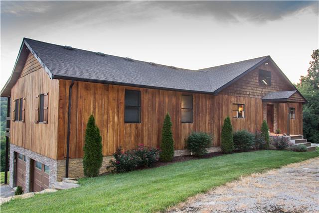 3375 Hawkins Branch Road Bethpage, TN 37022 - Photo 2 of 20 THIS RUSTIC HOME IS FULLY SIDED WITH BEECH WOOD! THE CRAFTSMANSHIP OF THIS HOME IS AMAZING IN EVERY WAY!!