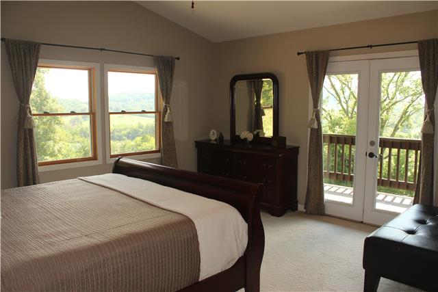 3375 Hawkins Branch Road Bethpage, TN 37022 - Photo 11 of 20 WAKE UP TO THE BEAUTY OF NATURE IN THIS MASTER SUITE WITH DOORS LEADING OUT TO THE BALCONY FOR YOUR ENJOYMENT OF THE VIEWS!