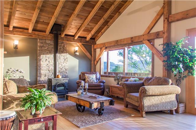 3375 Hawkins Branch Road Bethpage, TN 37022 - Photo 4 of 20 YOU WILL FEEL LIKE YOUR IN THE SMOKEY MOUNTAINS AS YOU RELAX BY THE FIRE IN THE LIVING RM LOOKING OUT OVER THE BEAUTIFUL MOUNTAIN VIEWS!