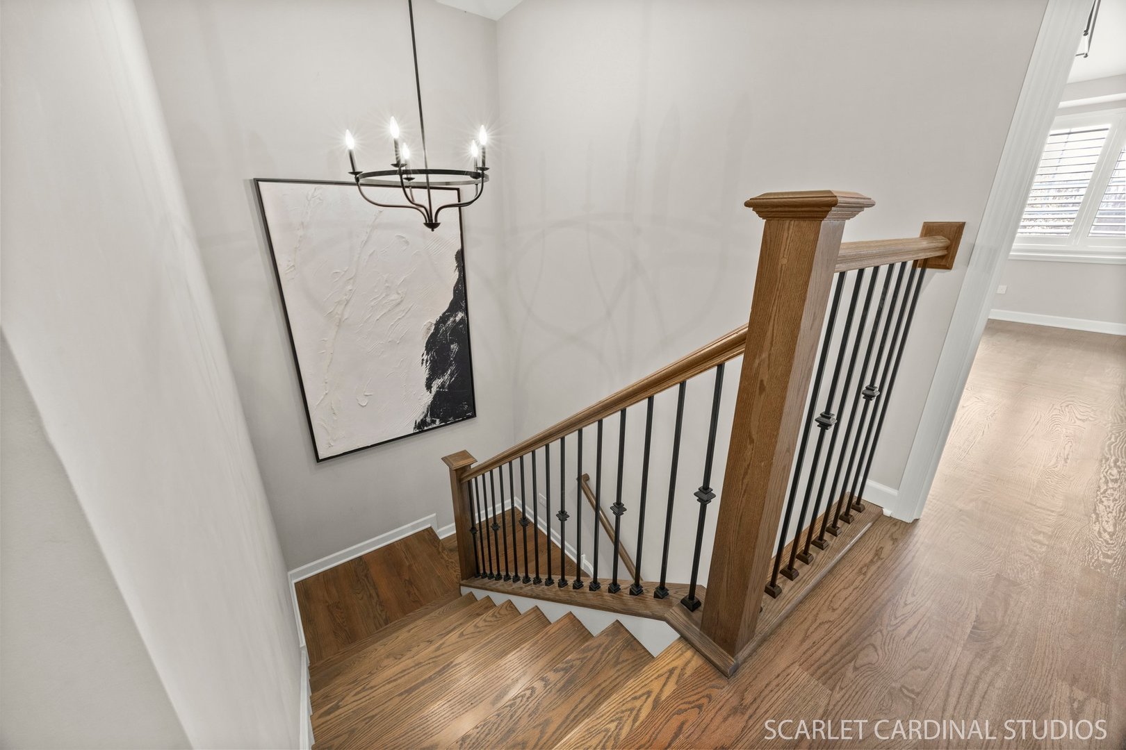 14253 Lacey Drive Lemont, IL 60439 - Photo 13 of 24 a view of a hallway with wooden floor and staircase