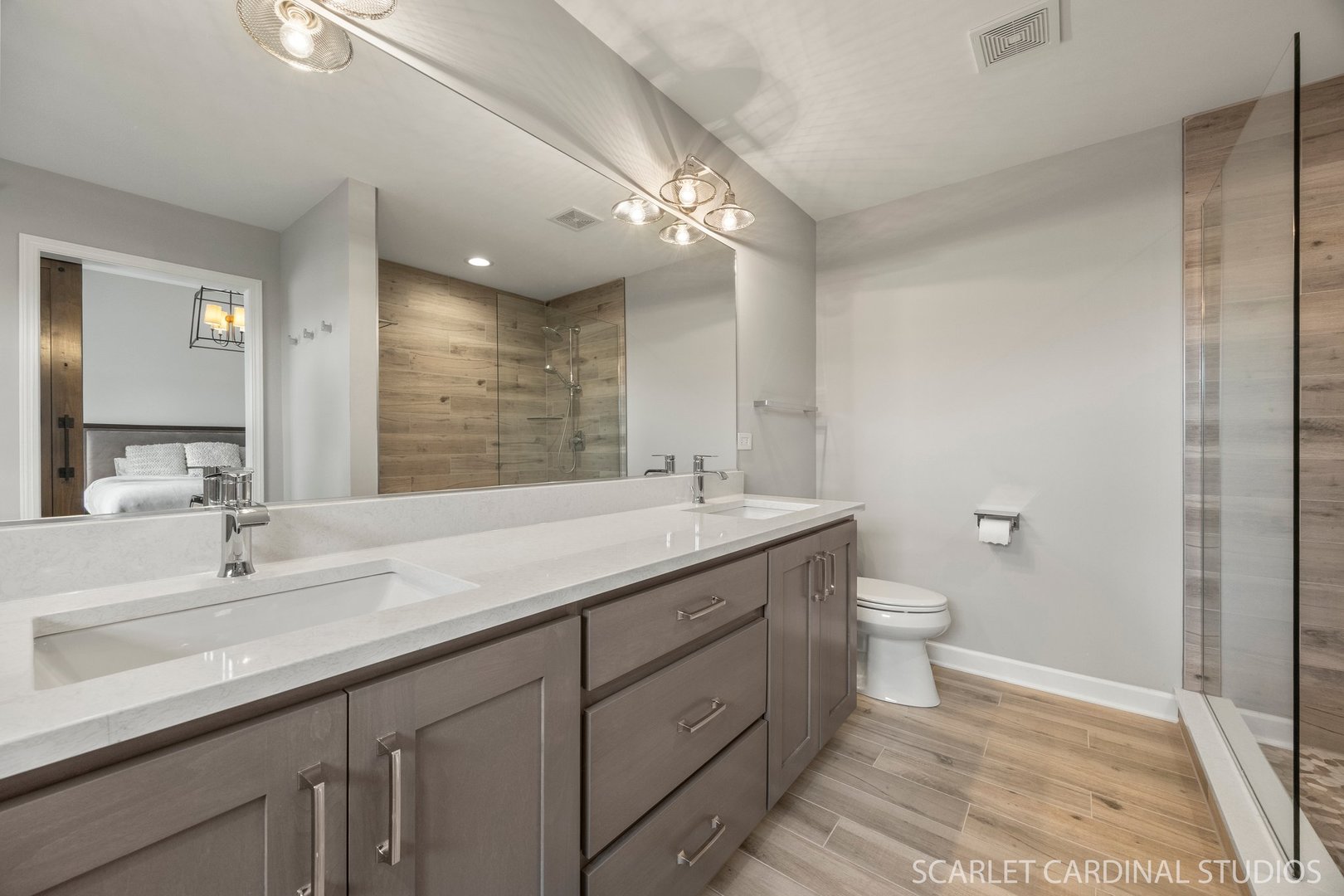 14253 Lacey Drive Lemont, IL 60439 - Photo 18 of 24 a bathroom with a double vanity sink mirror and toilet