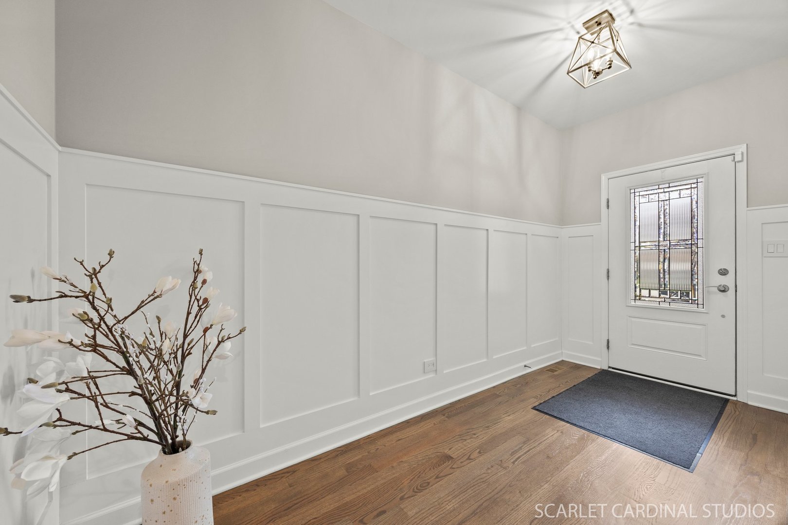 14253 Lacey Drive Lemont, IL 60439 - Photo 3 of 24 a view of a livingroom with wooden floor and a ceiling fan
