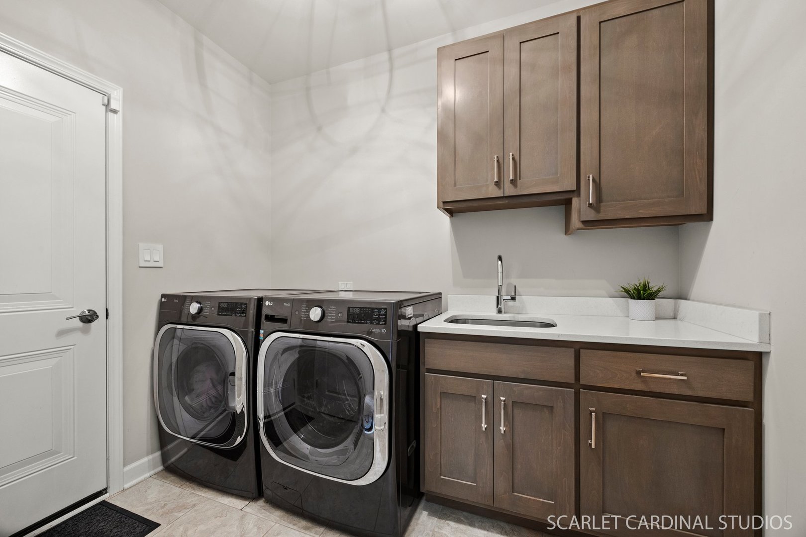 14253 Lacey Drive Lemont, IL 60439 - Photo 10 of 24 a utility room with sink dryer and washer
