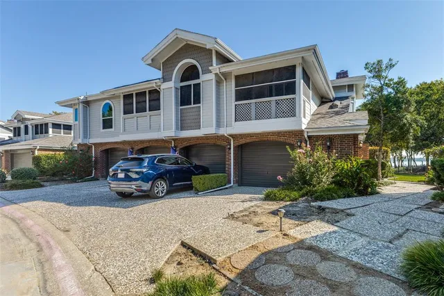a car parked in front of a house