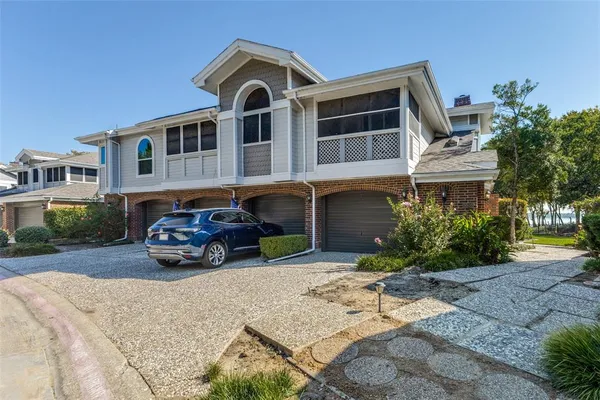 a car parked in front of a house