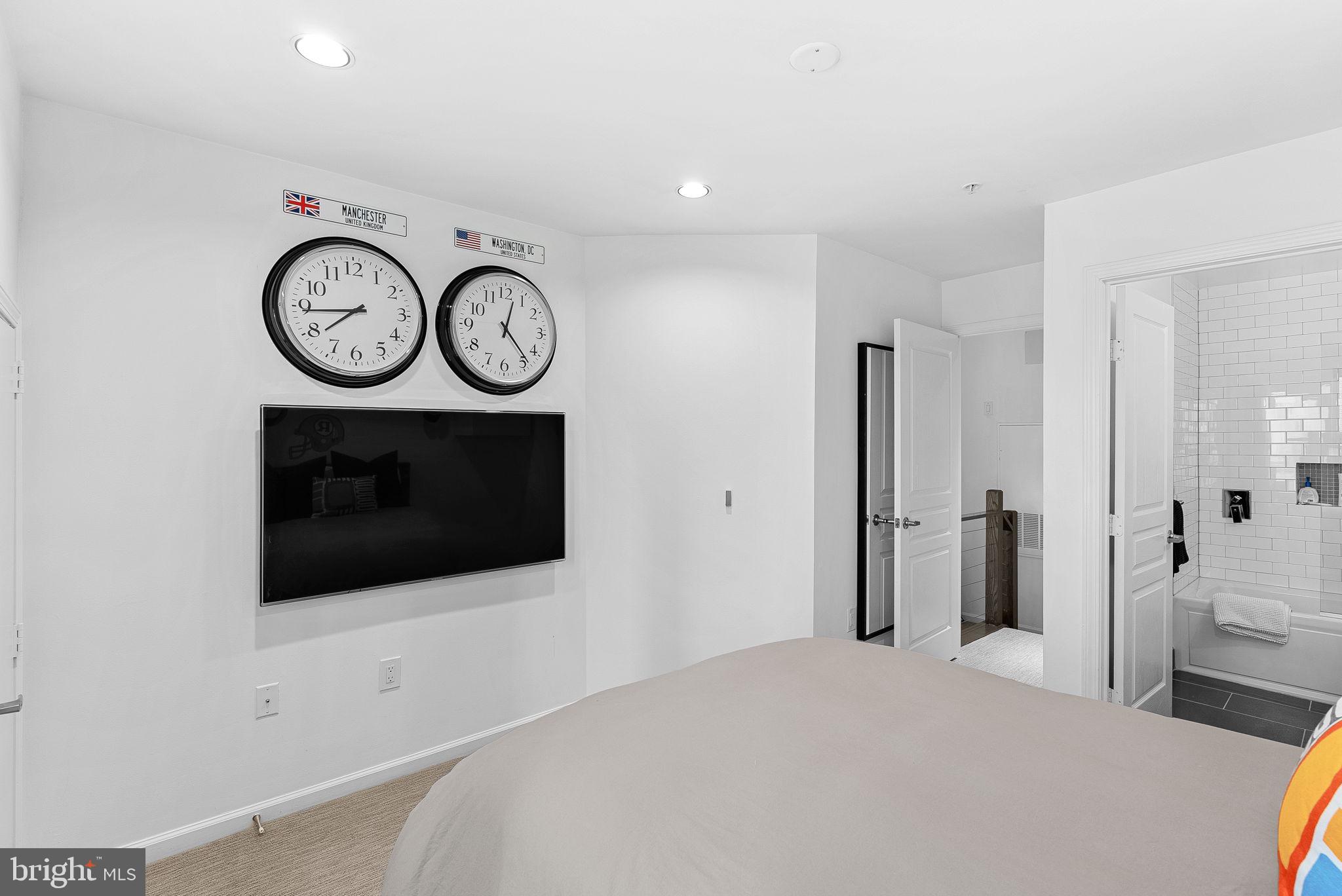 12000 Market Street, Unit 428 Reston, VA 20190 - Photo 32 of 105 2nd Bedroom with wall TV