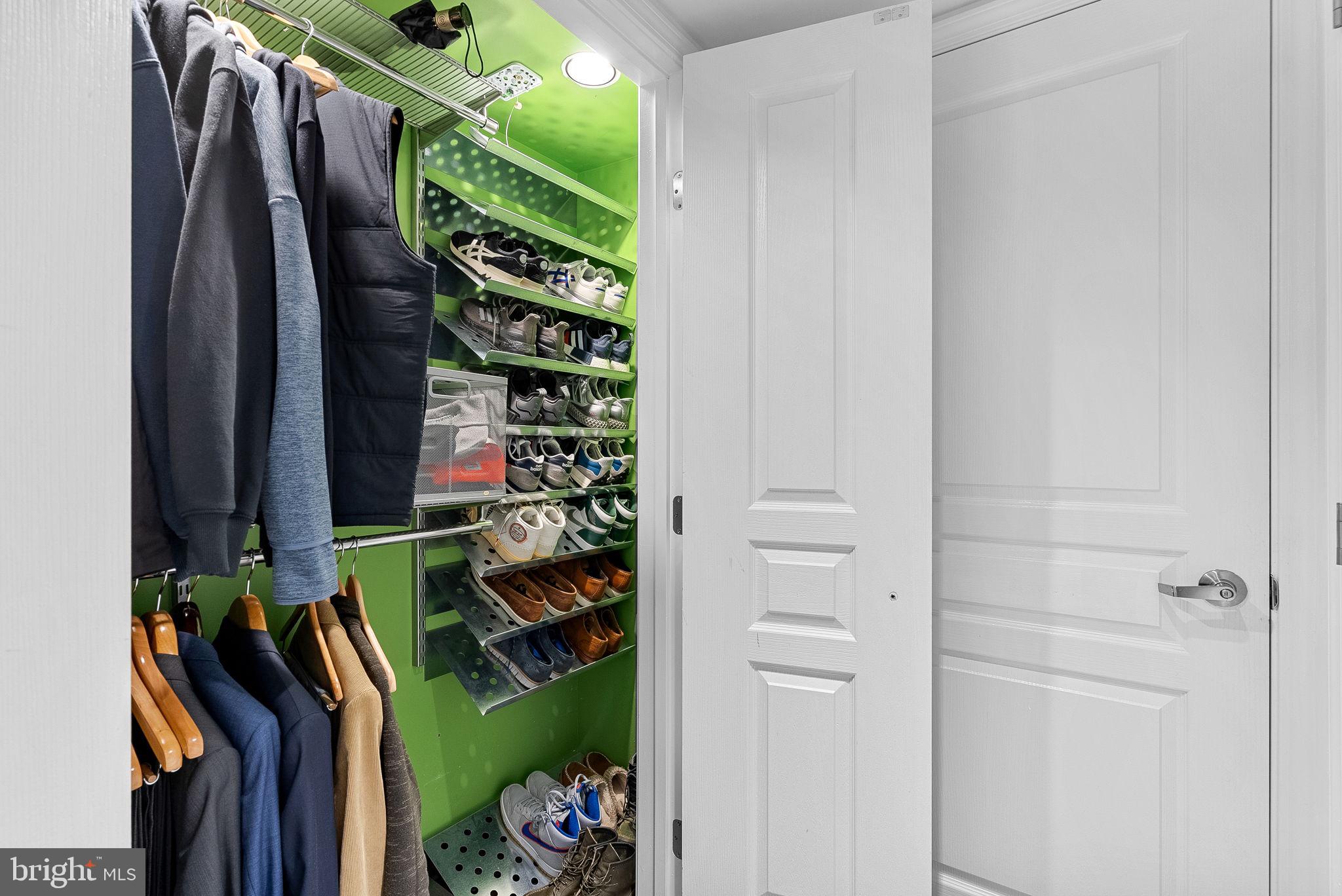 12000 Market Street, Unit 428 Reston, VA 20190 - Photo 34 of 105 Entrance Hall with custom Elfa closet system!