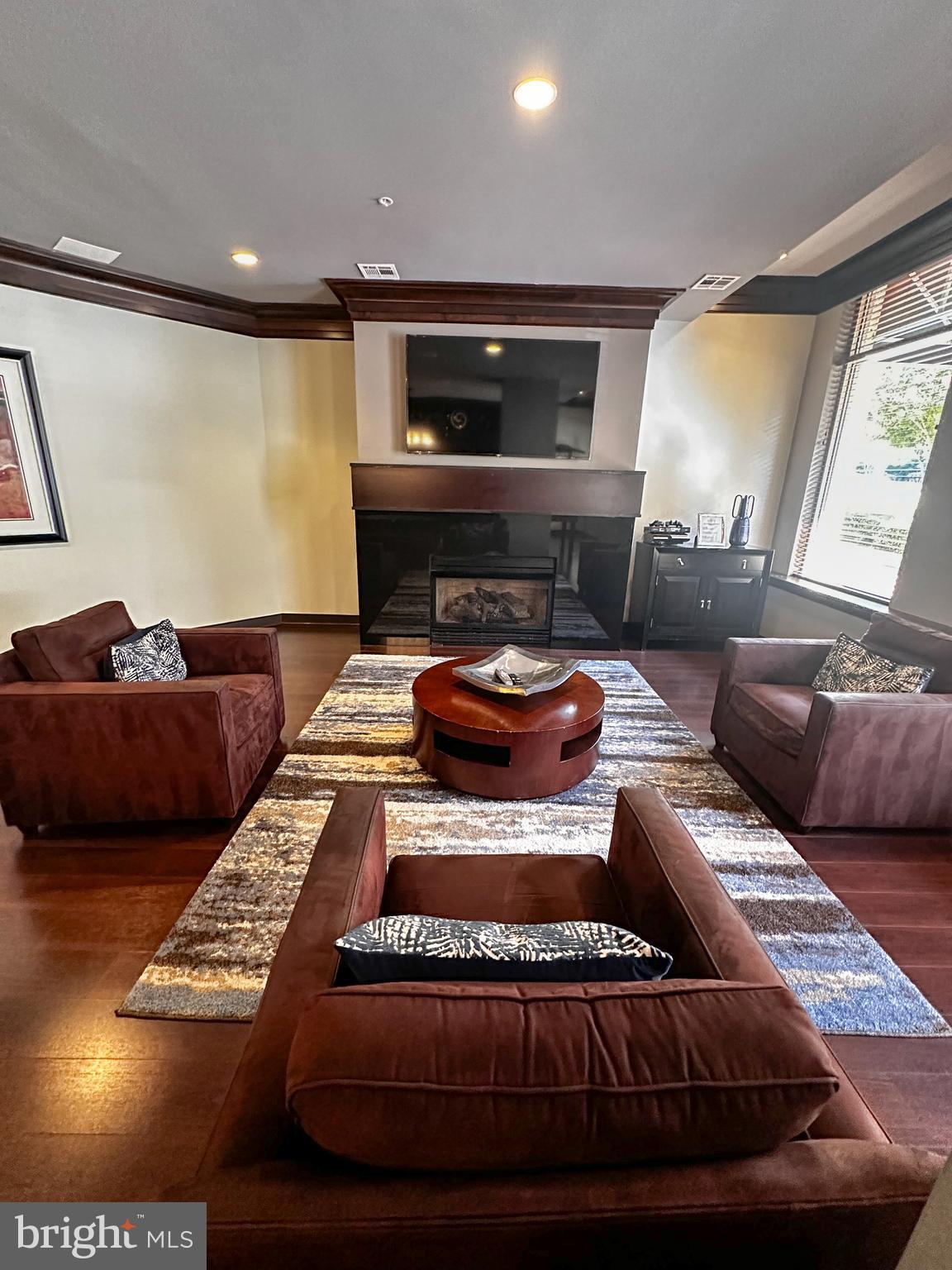 12000 Market Street, Unit 428 Reston, VA 20190 - Photo 51 of 105 Game Room fire place