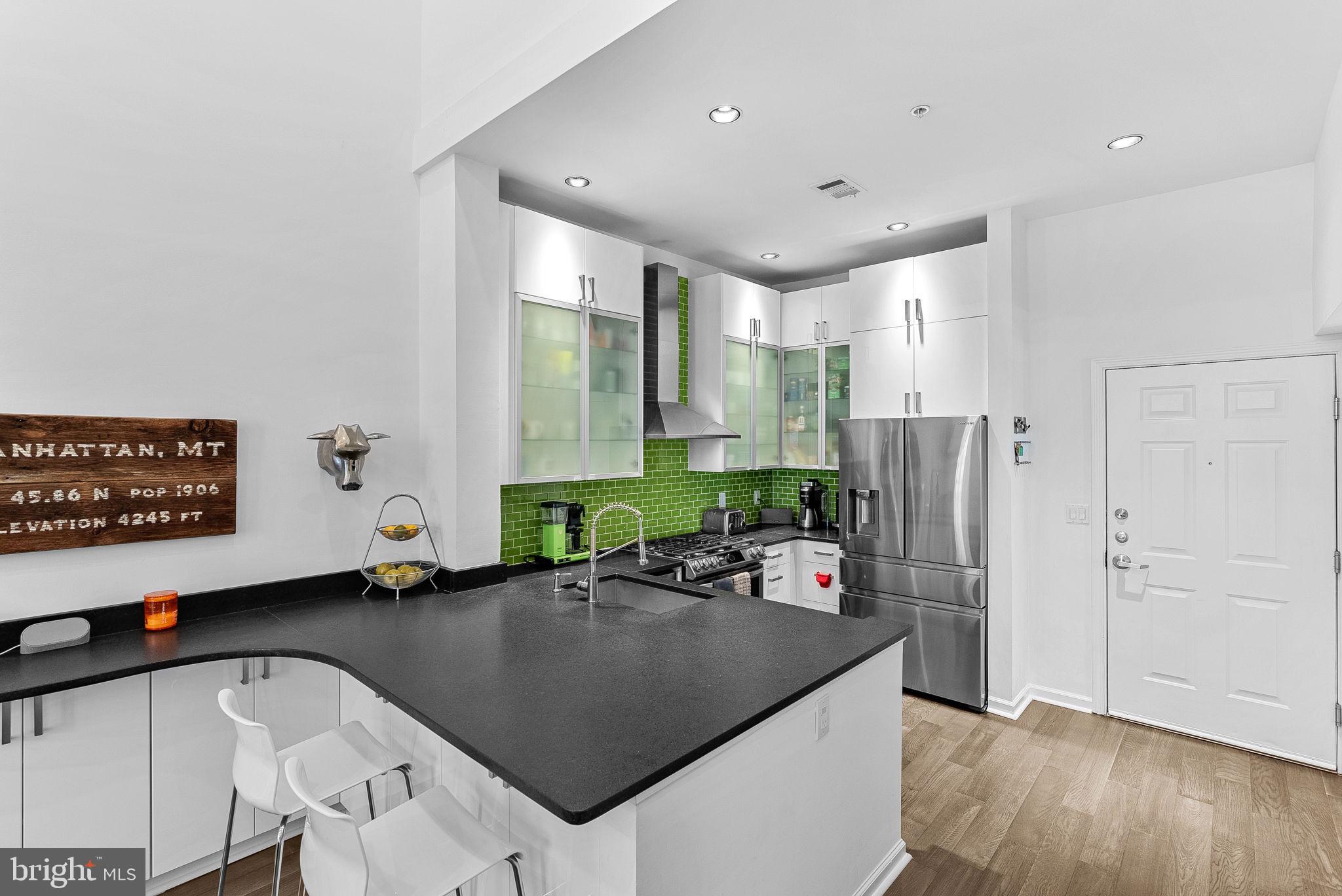 12000 Market Street, Unit 428 Reston, VA 20190 - Photo 6 of 105 Large textured granite for entertaining