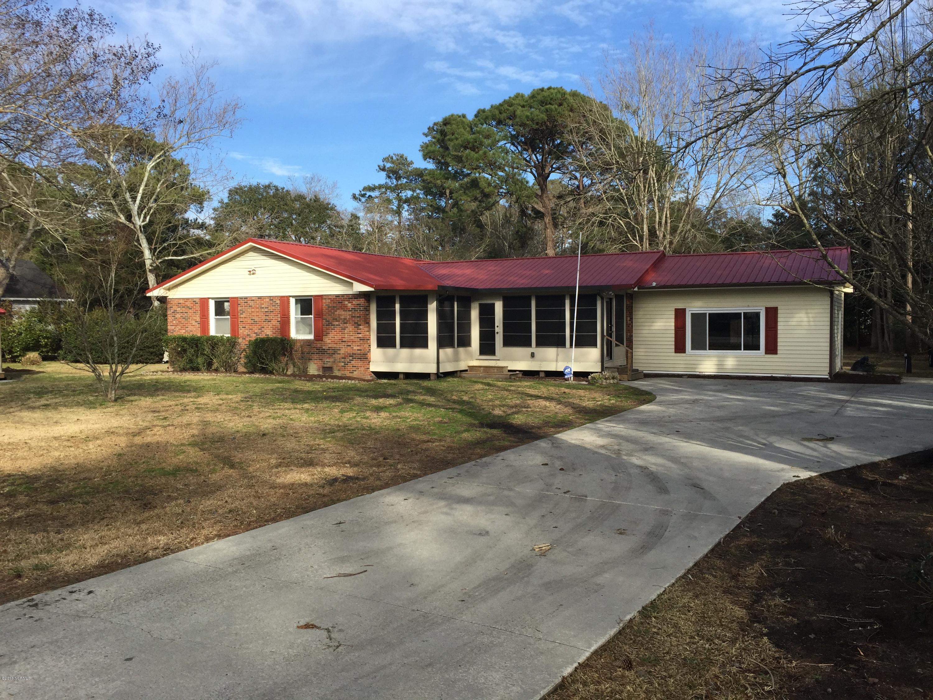 5629 Myrtle Grove Road Wilmington, NC 28409 - Photo 1 of 16 Large driveway leading to home
