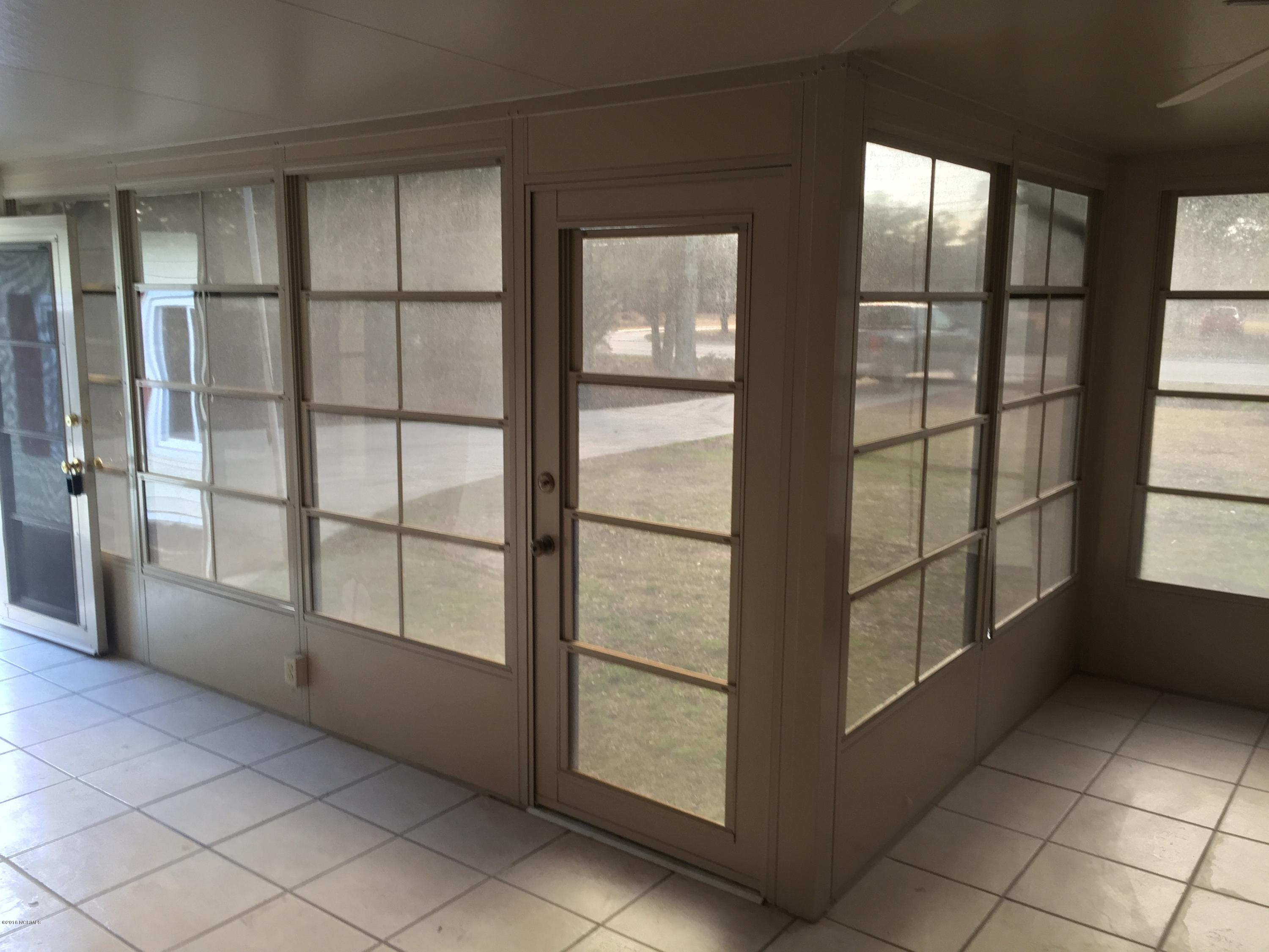5629 Myrtle Grove Road Wilmington, NC 28409 - Photo 2 of 16 Enclosed front porch