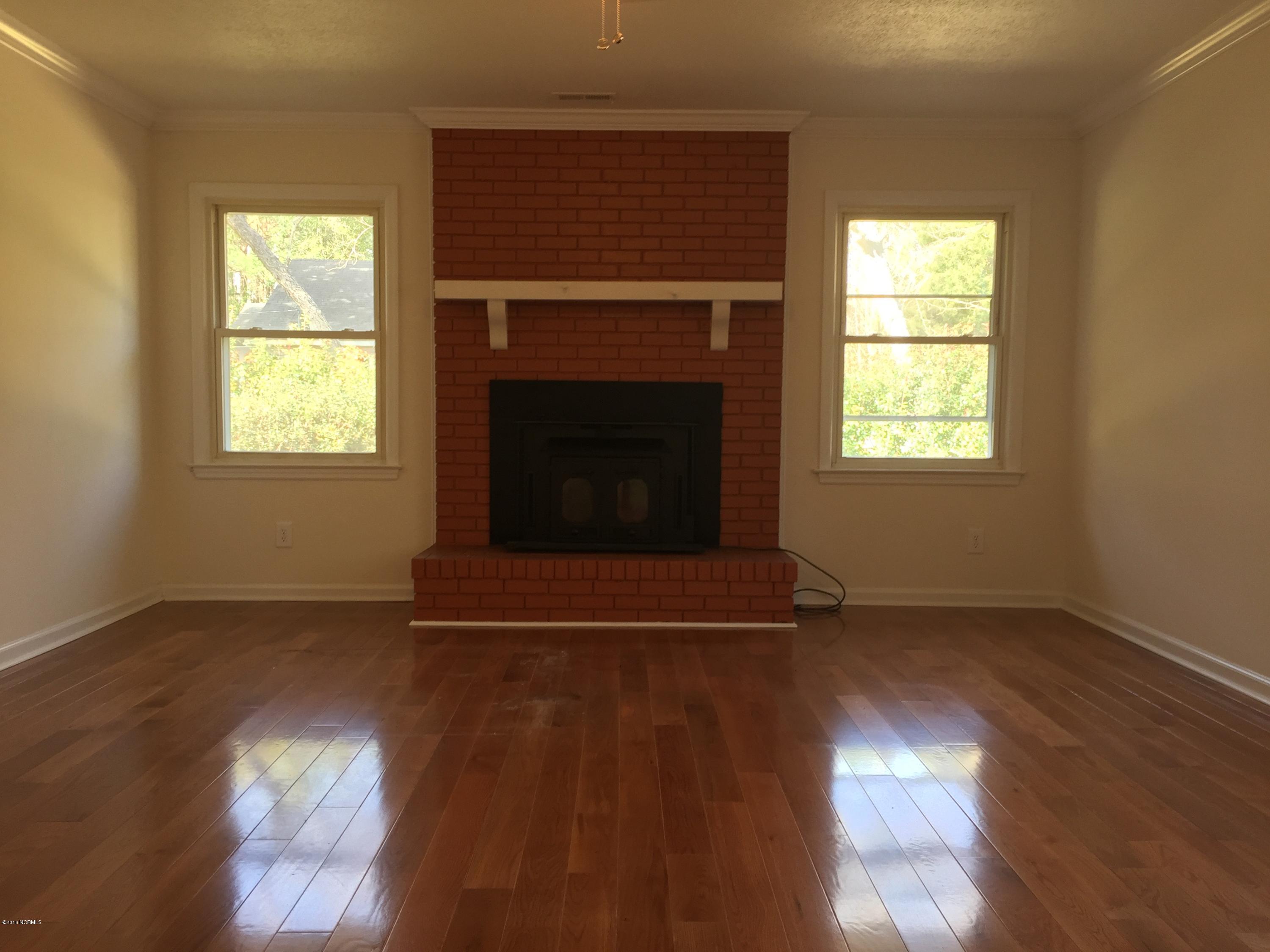 5629 Myrtle Grove Road Wilmington, NC 28409 - Photo 5 of 16 Living room with New Hardwoods