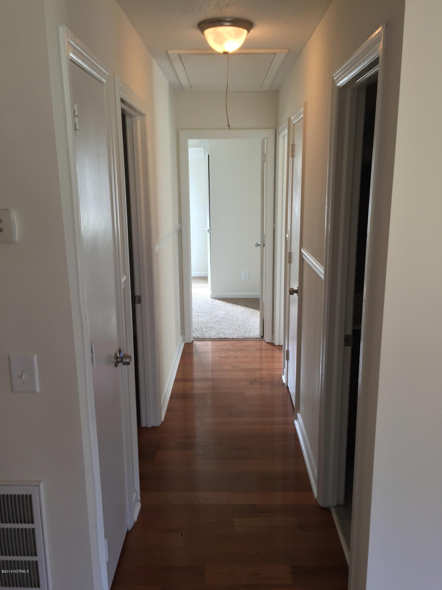 5629 Myrtle Grove Road Wilmington, NC 28409 - Photo 6 of 16 Hallway leading to bedrooms