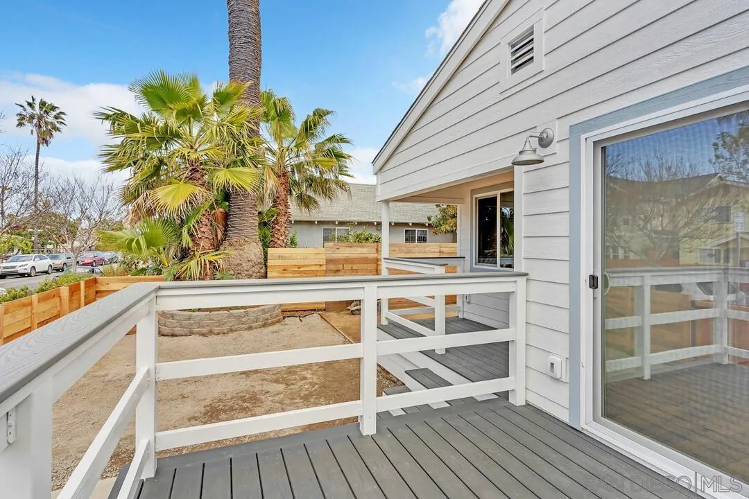 4922 Muir Avenue San Diego, CA 92107 - Photo 16 of 56 a view of deck with a flat screen tv and potted plant