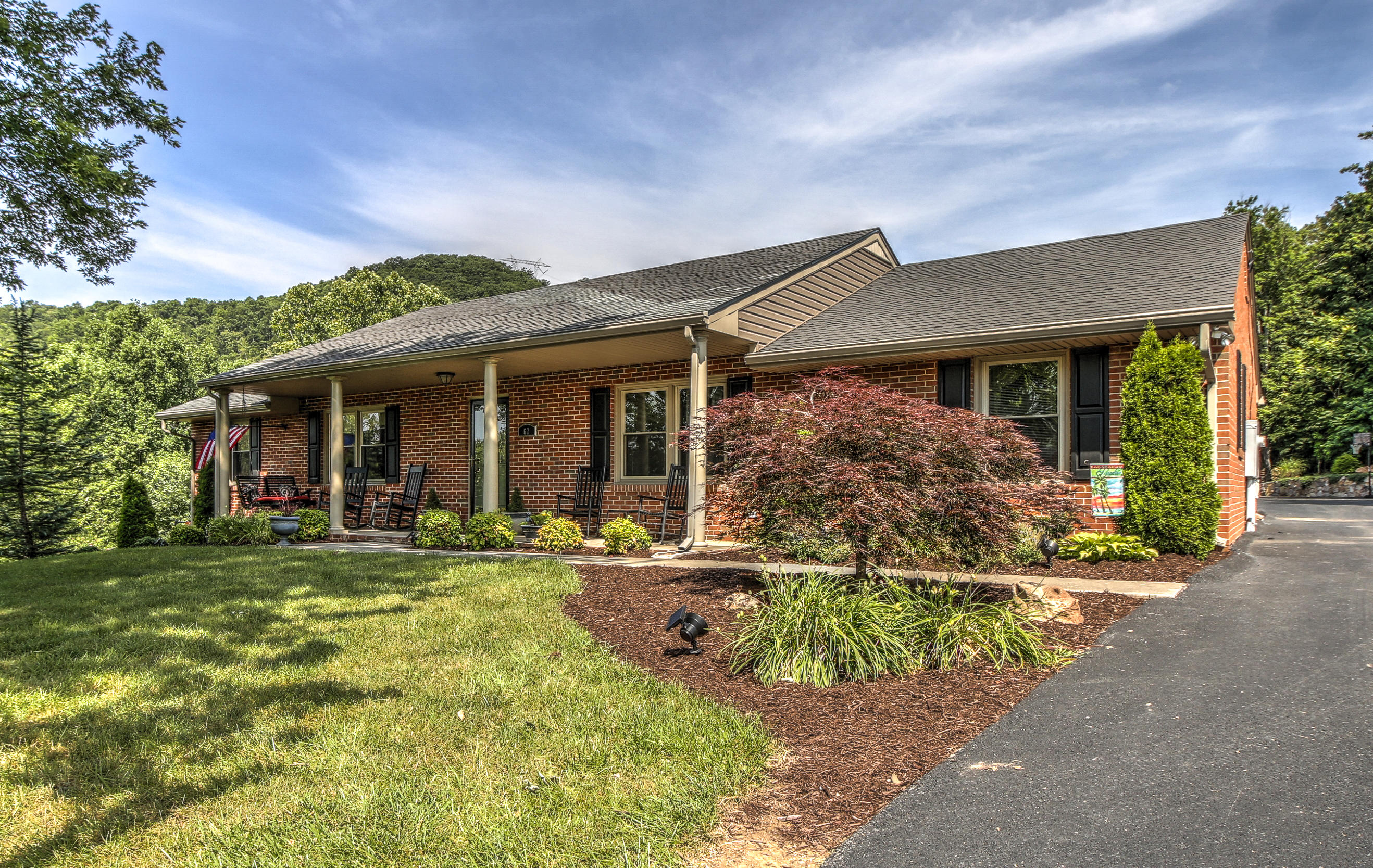 67 Walnut Drive Blue Ridge, VA 24064 - Photo 3 of 57 front view of a house with a yard