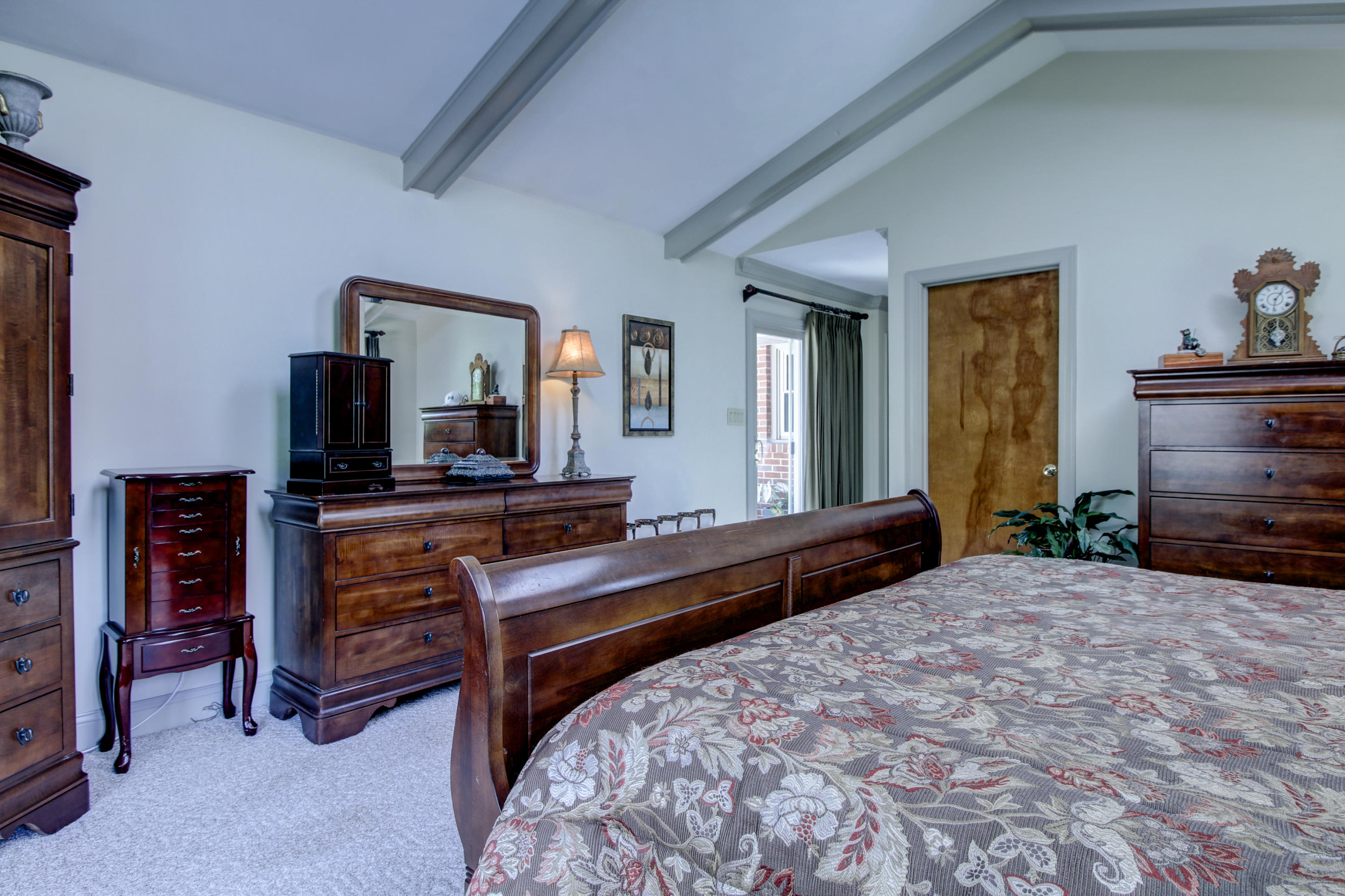 67 Walnut Drive Blue Ridge, VA 24064 - Photo 22 of 57 a bedroom with a bed and a dresser