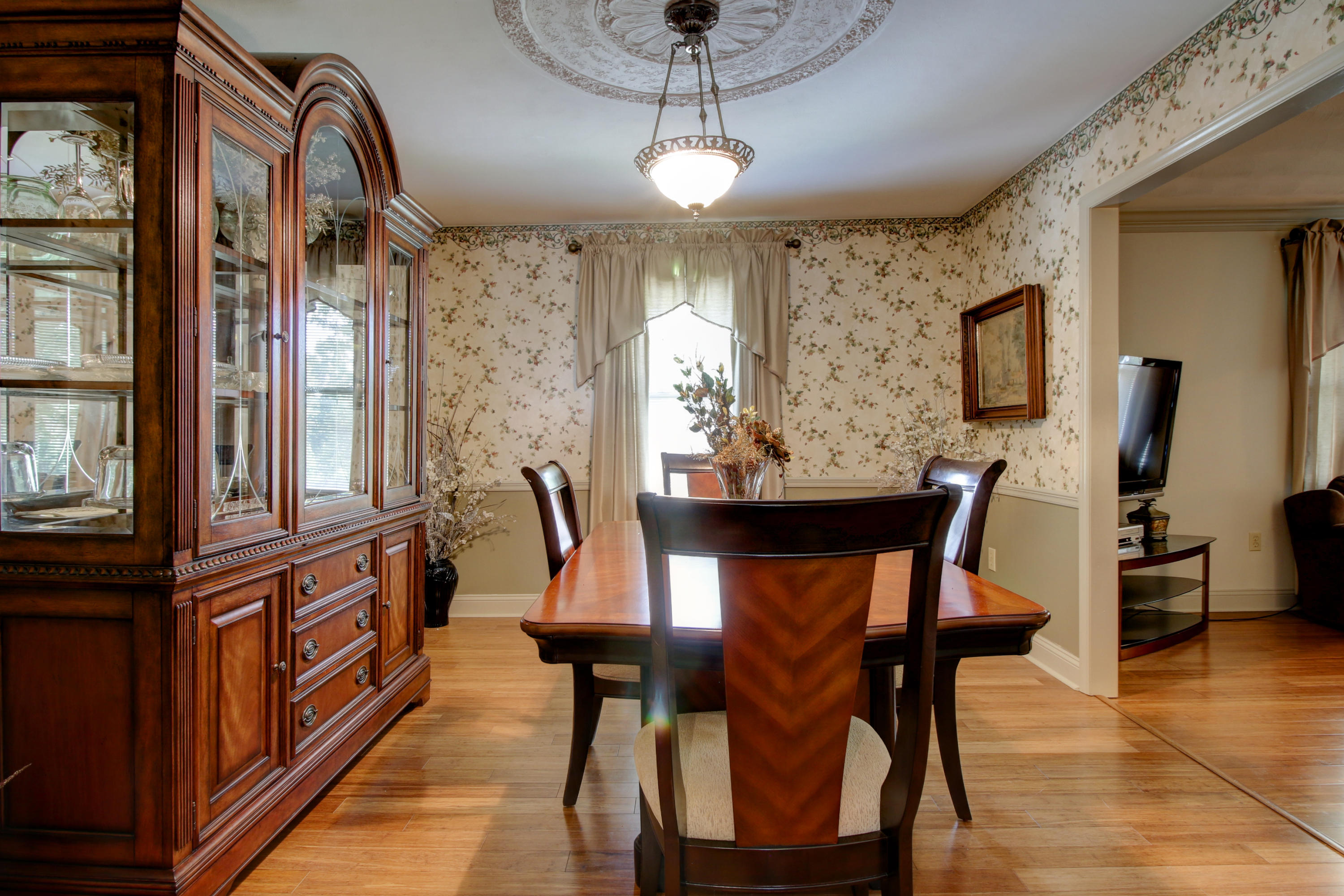 67 Walnut Drive Blue Ridge, VA 24064 - Photo 8 of 57 a view of a dining room with furniture and a chandelier