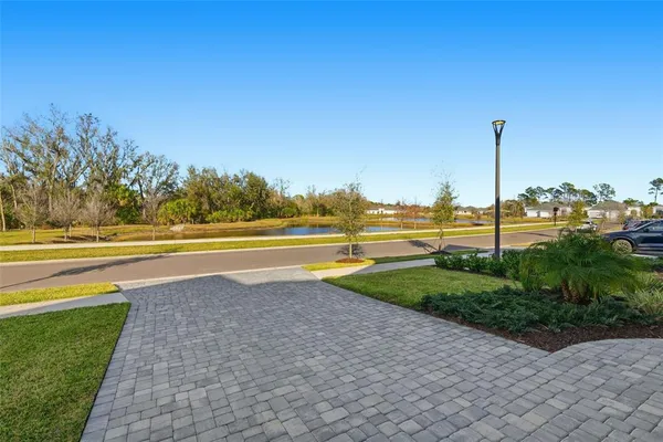 swimming pool view with a sitting space