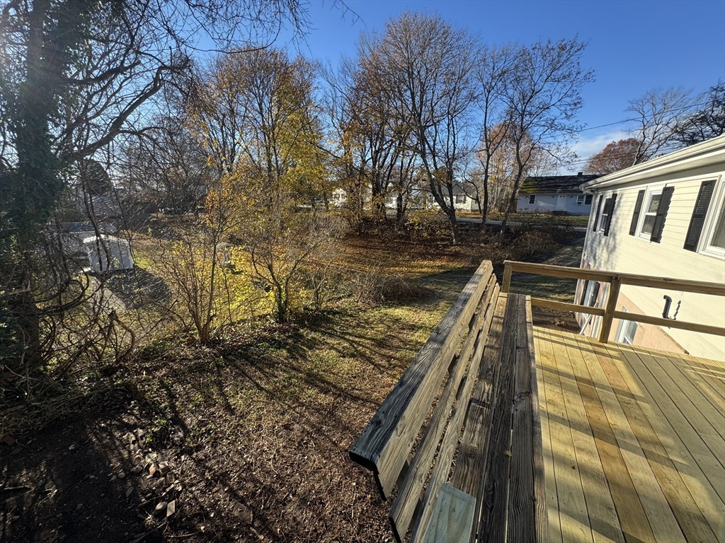 8 Nicks Rock Road, Unit 1 Plymouth, MA 02360 - Photo 25 of 27 a view of a house with backyard