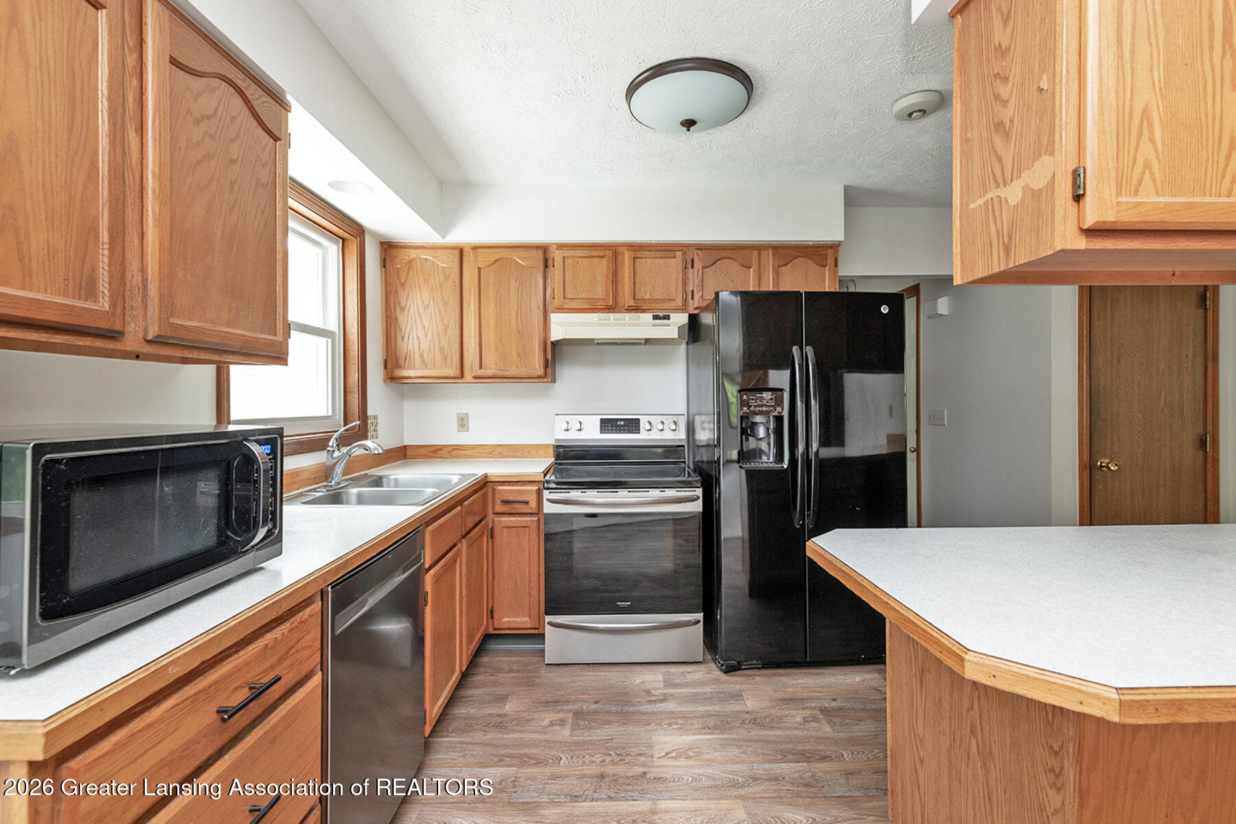 2620 Grovenburg Road Lansing, MI 48911 - Photo 11 of 39 11
