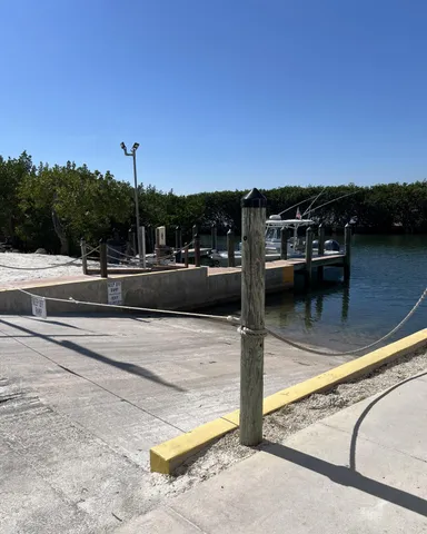 a outdoor living space with furniture and a floor to ceiling window